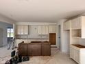 Spacious kitchen featuring cabinets and island ready for appliances and countertops at 3110 Montgomery Blvd, Lapel, IN 46051