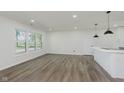 Bright living room with new floors at 3120 S Meridian Rd, Greenfield, IN 46140