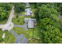 An aerial view of a home showcasing its backyard, deck, and proximity to neighboring properties at 7780 Cree Trl, Indianapolis, IN 46250