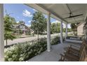 Inviting front porch with swing and rocking chairs, perfect for relaxing outdoors at 847 E Jefferson St, Franklin, IN 46131