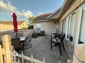 Charming outdoor patio with comfortable seating, perfect for relaxing or entertaining at 11503 Winding Wood Dr, Indianapolis, IN 46235