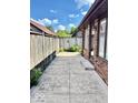 Exterior view of the outdoor patio showcasing ample space for relaxing and entertaining at 3400 W Riggin Rd, Muncie, IN 47304