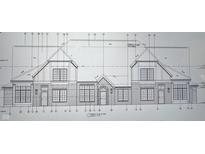 Detailed front elevation blueprint showcasing the home's brick facade and window arrangements at 6673 Beekman Pl # C, Zionsville, IN 46077