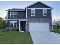 Two story home with blue siding and stone veneer and a two car garage at 7108 Parkstay Ct, Indianapolis, IN 46113