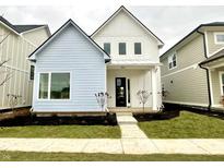 Two-story craftsman style home with light blue and white siding at 9870 Bucklebury Ln, Carmel, IN 46280