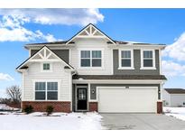 Two-story home with gray and white siding, brick accents, and a two-car garage at 3856 Jason Ave, Franklin, IN 46131