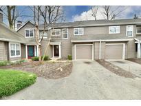 Charming townhome with attached garages and driveway at 7854 Harbour Isle, Indianapolis, IN 46240
