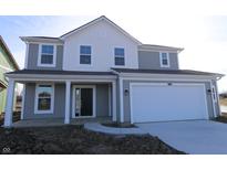 New two-story home showcasing a welcoming front porch and a two car attached garage at 9959 Redwood Peak Ln, Indianapolis, IN 46259