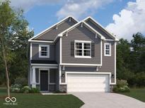 Two-story home with gray siding, white trim, and a two-car garage at 5057 Modernist Blvd, Indianapolis, IN 46237
