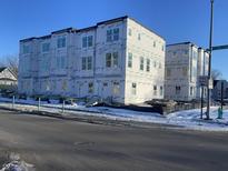 New construction townhouses, winter scene at 2611 E New York St, Indianapolis, IN 46201