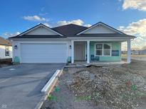 Newly constructed home with white siding, brown roof, and attached two-car garage at 6629 Sulgrove Pl, Indianapolis, IN 46221