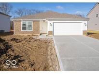 New construction home with attached garage and landscaping at 6112 Card Blvd, Indianapolis, IN 46221