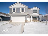 Two-story house with gray siding, white trim, and a two-car garage at 3214 W Keepsake Ln, Monrovia, IN 46157