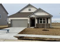 Charming single-Gathering home featuring a two-car garage and covered entryway at 2184 Gambel Ln, Danville, IN 46122