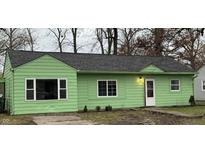 Charming ranch home with a freshly painted exterior and a new roof at 6255 Raleigh Dr, Indianapolis, IN 46219