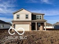Charming two-story home with a two-car garage and neutral siding at 6272 Granby Dr, Whitestown, IN 46075