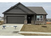 Beautiful single-Gathering home with a two-car garage, stylish siding, and a well-manicured lawn at 2170 Warbler St, Danville, IN 46122