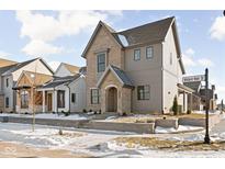 Two-story craftsman home with brick and siding exterior, and a snow covered lawn at 1667 Midland Main St, Westfield, IN 46074