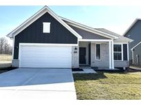 Charming single-Gathering home featuring a two-car garage and well-maintained front yard at 1023 Cyprian Way, Lebanon, IN 46052