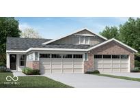 Brick and shingle two-car garage home with landscaping at 7391 Broadview Ln, McCordsville, IN 46055