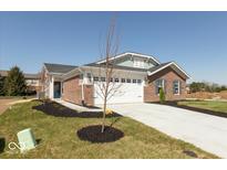 Charming single-Gathering home featuring a well-manicured lawn and a two-car garage, perfect for modern living at 7370 Broadview Ln, McCordsville, IN 46055