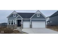 Charming two-story home with attached two car garage and craftsman-style elevation at 6260 Stone Side Dr, Plainfield, IN 46168