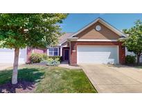 Charming single-Gathering home with well-manicured lawn and a two car garage at 3538 Heathcliff Ct, Westfield, IN 46074