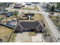 Charming multi-Gathering home featuring well-maintained landscaping and convenient driveway access at 11 Eastern Ave, Brownsburg, IN 46112