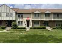 Charming townhomes with well-maintained lawns and unique architectural details for inviting curb appeal at 8021 E 20Th St, Indianapolis, IN 46219