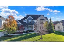 Stunning two-story home with charming curb appeal and stone accents at 16845 Downstream Dr, Westfield, IN 46062