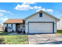 Ranch home with attached garage and landscaped lawn at 4193 Sycamore Ct, Franklin, IN 46131