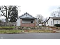 Brick home with front porch and steps, needs some TLC at 139 S Jefferson St, Martinsville, IN 46151