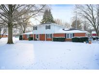 Brick ranch house with snow covered yard at 4025 E 200 S, Anderson, IN 46017