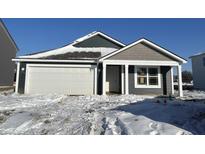 Newly constructed home with gray siding, white garage door, and covered porch at 3343 Waitt St, Sheridan, IN 46069