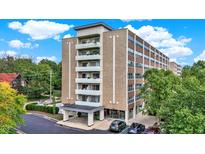 Modern multi-story building with ample parking and landscaping at 3965 N Meridian St # Apt 6C, Indianapolis, IN 46208