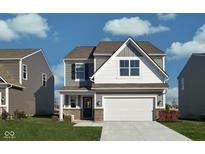 Charming two-story home with gray siding, a two-car garage, and a well-manicured front lawn at 11620 Hartwell St, Indianapolis, IN 46235