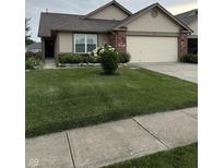 Charming single-story home with well-maintained lawn and curb appeal at 1294 Lexington Trl, Greenfield, IN 46140