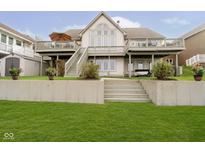 Two story home with large deck and backyard landscaping at 3150 Beach Blvd, Cicero, IN 46034