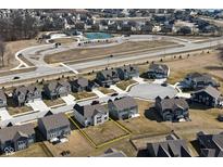 Aerial view of a home highlighting its location within a Gathering-friendly community with playgrounds and amenities at 4061 Omaha Dr, Bargersville, IN 46106