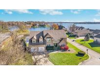 Luxury home on waterfront lot with expansive lake views and two-car garage at 9667 Spruance Ct, Indianapolis, IN 46256