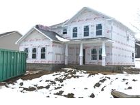 Two-story house under construction, showcasing its design and features at 657 Lake Vista Dr, Columbus, IN 47201
