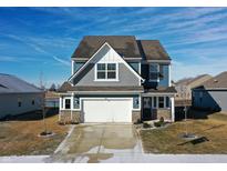 Charming two-story home featuring a two-car garage and inviting curb appeal at 2378 Dixon Creek Dr, Whitestown, IN 46075