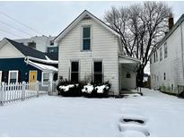 White house exterior in snowy front yard at 1125 Laurel St, Indianapolis, IN 46203