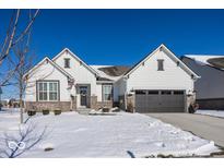 Stunning two-story home with a white exterior, brick accents, and a two-car garage at 19046 Beverly Shones Ln, Noblesville, IN 46062