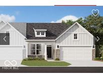 Two-story craftsman style home with white siding, brick accents, and a two-car garage at 9711 Palermo Ave, Indianapolis, IN 46239