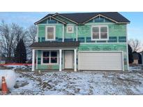 New two-story home with white siding and a two-car garage at 24421 Stout St, Sheridan, IN 46069