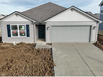 Charming one-story home with a gray exterior, attached garage, and inviting curb appeal at 11275 N Quillow Way, Monrovia, IN 46157