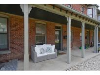 Inviting front porch with seating area, perfect for relaxing at 1442 N Illinois St # 19, Indianapolis, IN 46202