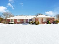 Brick ranch home with snow-covered lawn at 4506 Winter Dr, Anderson, IN 46012