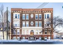 Three-story brick apartment building with ornate detailing at 643 Fort Wayne Ave # H, Indianapolis, IN 46204